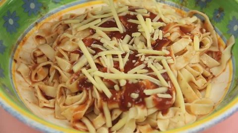 Shredded Cheese Sprinkled On Pasta Stock Footage 45899448