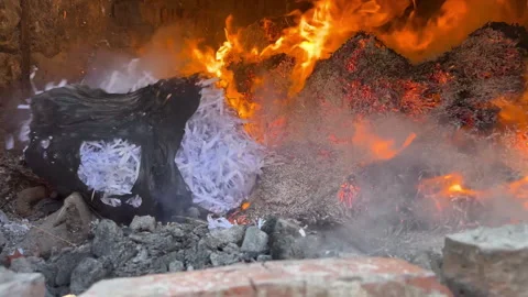 Shredded Confidential Documents Burning In Brick Furnace Close Up Stock Footage 341727879