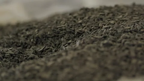 Shredded Grey Plastic Regrind Flakes Close Up At Recycling Factory Stock Footage 343892728
