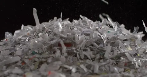 Shredded paper is captured in slow motion Stock Footage 344985931