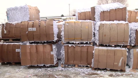 Shredded paper pressed and ready to be sent for recycling Stock-Footage 104645559