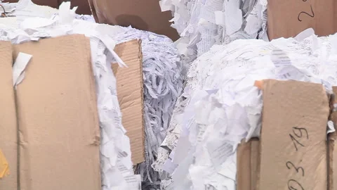 Shredded paper pressed and ready to be sent for recycling Stock Footage 104645805