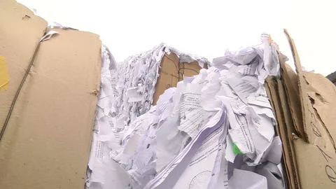 Shredded paper pressed and ready to be sent for recycling Stock Footage 104645919