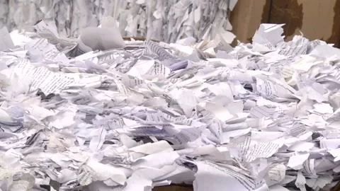 Shredded paper pressed and ready to be sent for recycling Stock Footage 104646130
