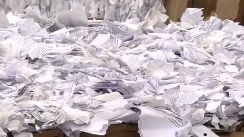 Shredded paper pressed and ready to be sent for recycling Stock Footage 104646134