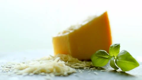 Shredded parmesan cheese and basil leaf, organic product recipe Stock Footage 120934983