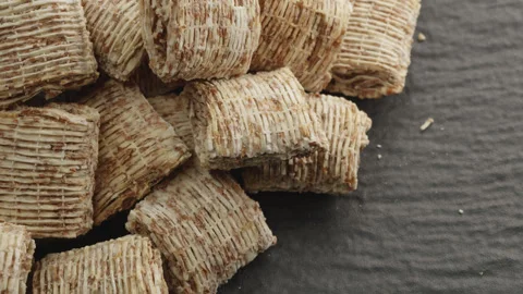Shredded wheat cereal mini macro close up presentation slowly rotating stoc.. Stock Footage 344685024
