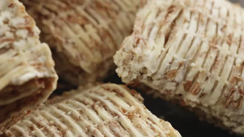 Shredded wheat cereal mini macro close up presentation slowly rotating stoc.. Stock Footage 344685521
