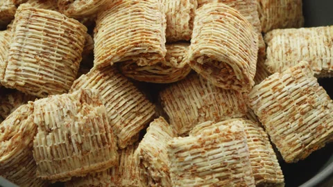 Shredded wheat cereal mini macro close up presentation slowly rotating stoc.. Stock Footage 344685960