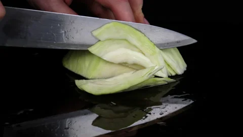 Shredding cabbage for salad 스톡 동영상 174098345