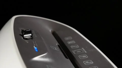Shredding documents in a paper shredder Stock Footage 56947624