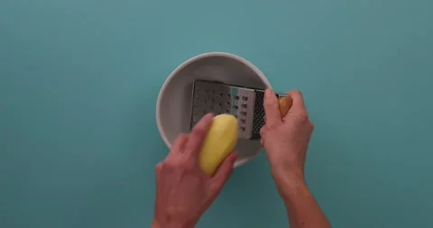 Shredding a potato 1 Video stock 132149977
