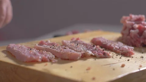 Shredding the raw bacon of spices Stock Footage 111272939