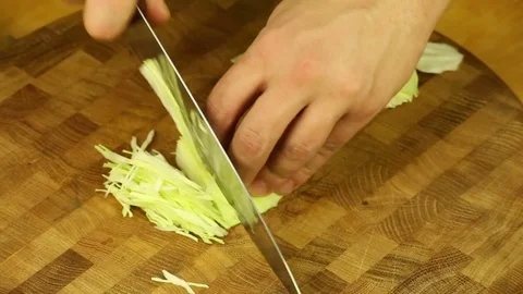 Shredding of white cabbage Stock Footage 83261960