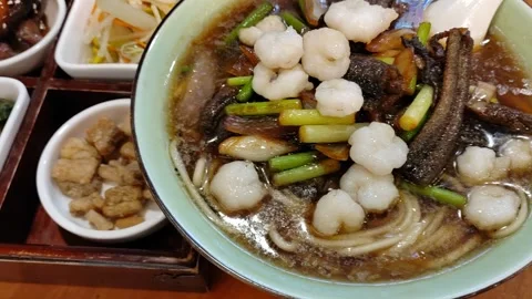 Shrimp and Eel Noodles with Side Dishes (Hangzhou), Chinese Food Close-up Vídeo Stock 331613325