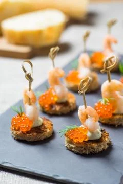 Shrimp Appetizer served on toasted bread Stock Photos
