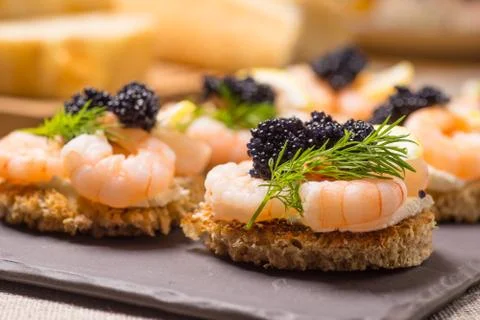 Shrimp Appetizer served on toasted bread Stock Photos