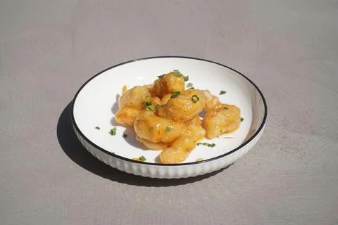 Shrimp in batter on a table in a restaurant Stock Photos