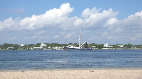 Shrimp Boat Going Down a River Stock Footage 72956019