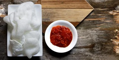 Shrimp bread snack in a small tray with spicy tomato sauce for snacking Foto stock
