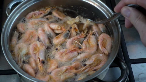 Shrimp cooked in a pan in slow motion. Stock Footage 124634370