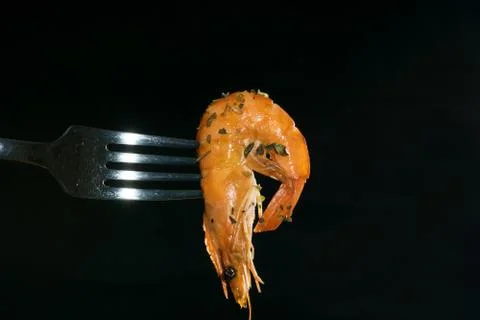 Shrimp on a fork Stock Photos