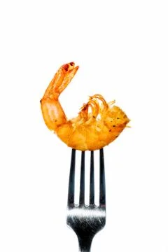 Shrimp on a fork Stock Photos
