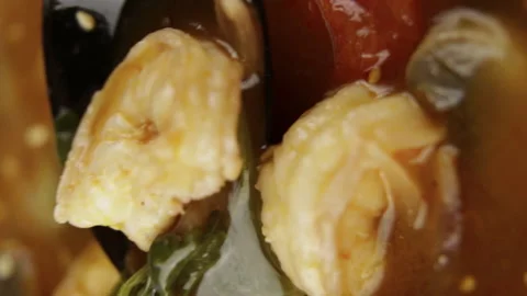 Shrimp lies on a spoon. Close up. Stock Footage 156163059