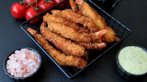 Shrimp or prawn tempura breaded with salt, spices and tartar sauce, Asian cuisin Stock Footage 340036898