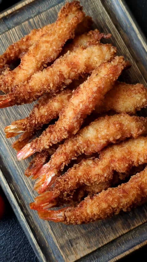 Shrimp or prawn tempura breaded with salt, spices and tartar sauce, Asian cuisin Stock Footage 340036992