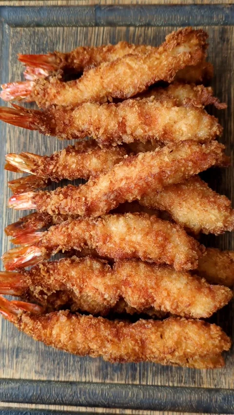 Shrimp or prawn tempura breaded with salt, spices and tartar sauce, Asian cuisin Stock Footage 340037000