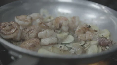 Shrimp in pan on stove Stock Footage 172034358