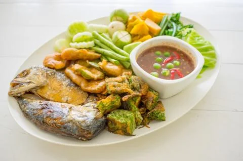 Shrimp paste with fried mackerel and vegetable Stock Photos