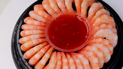 Shrimp platter rotating in circular. shrimp with sweet and sour chili sauce in Stock Footage 308003465