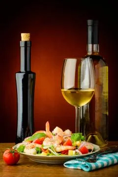 Shrimp salad and white wine Stock Photos