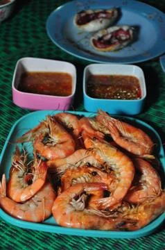 Shrimp with sauce Stock Photos