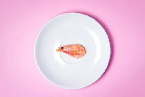 Shrimp on a white plate. Stock Photos