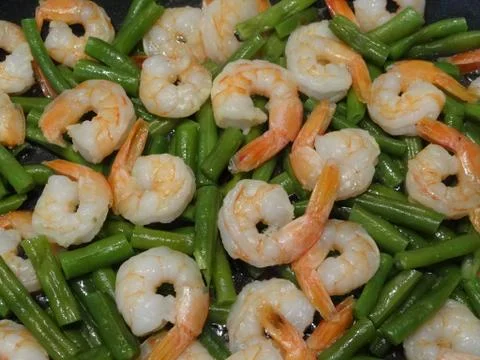 Shrimps with beans Stock Photos
