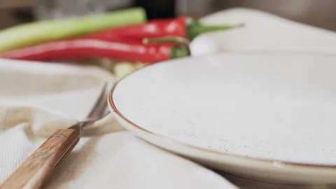 Shrimps falling from a pan into a plate. Stock Footage 126896397