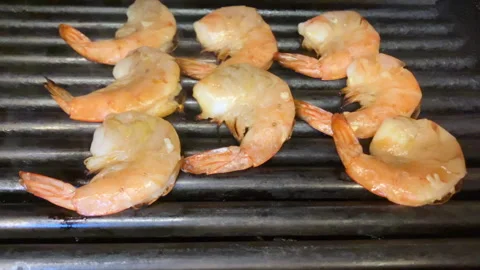 Shrimps on the grill Stock Footage 276656753