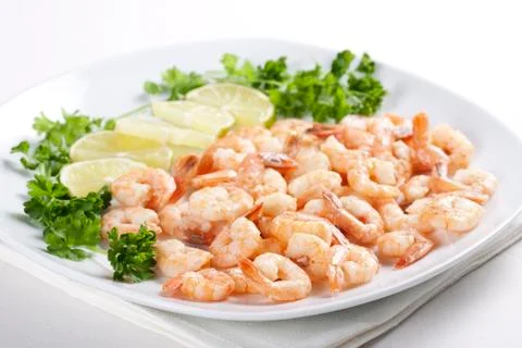 Shrimps with lime Stock Photos