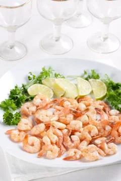Shrimps with lime Stock Photos