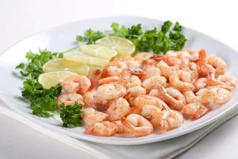 Shrimps with lime Stock Photos