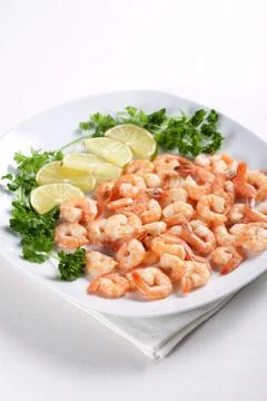 Shrimps with lime Stock Photos