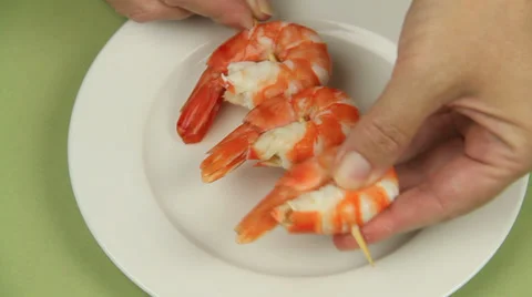 Shrimps On To Skewer Stock Footage 32360838