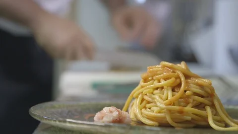 Shrimps spaghetti plate with background chef Stock Footage 89326579