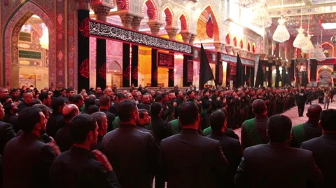 Shrine's servants mourning for Imam Hussein inside Hussein's shrine, Karbala 777 Video stock 45160681
