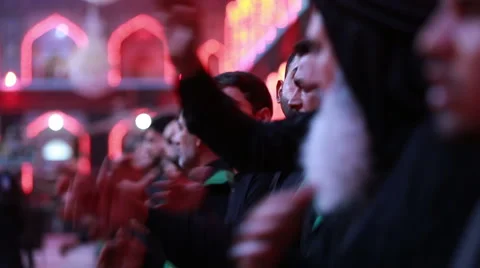 Shrine's servants mourning for Imam Hussein inside Hussein's shrine, Karbala 795 Stock Footage 45162535