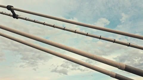 The shrouds of the bridge on the background of the sunset sky Video stock 305455614