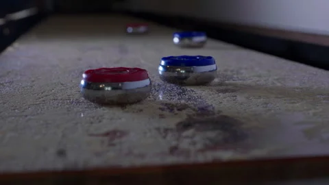 SHUFFLE BOARD BLOCKING SHOT.  4K ECU.  SLOW MOTION AT 60 FPS.  NO PEOPLE. Stock Footage 246610714